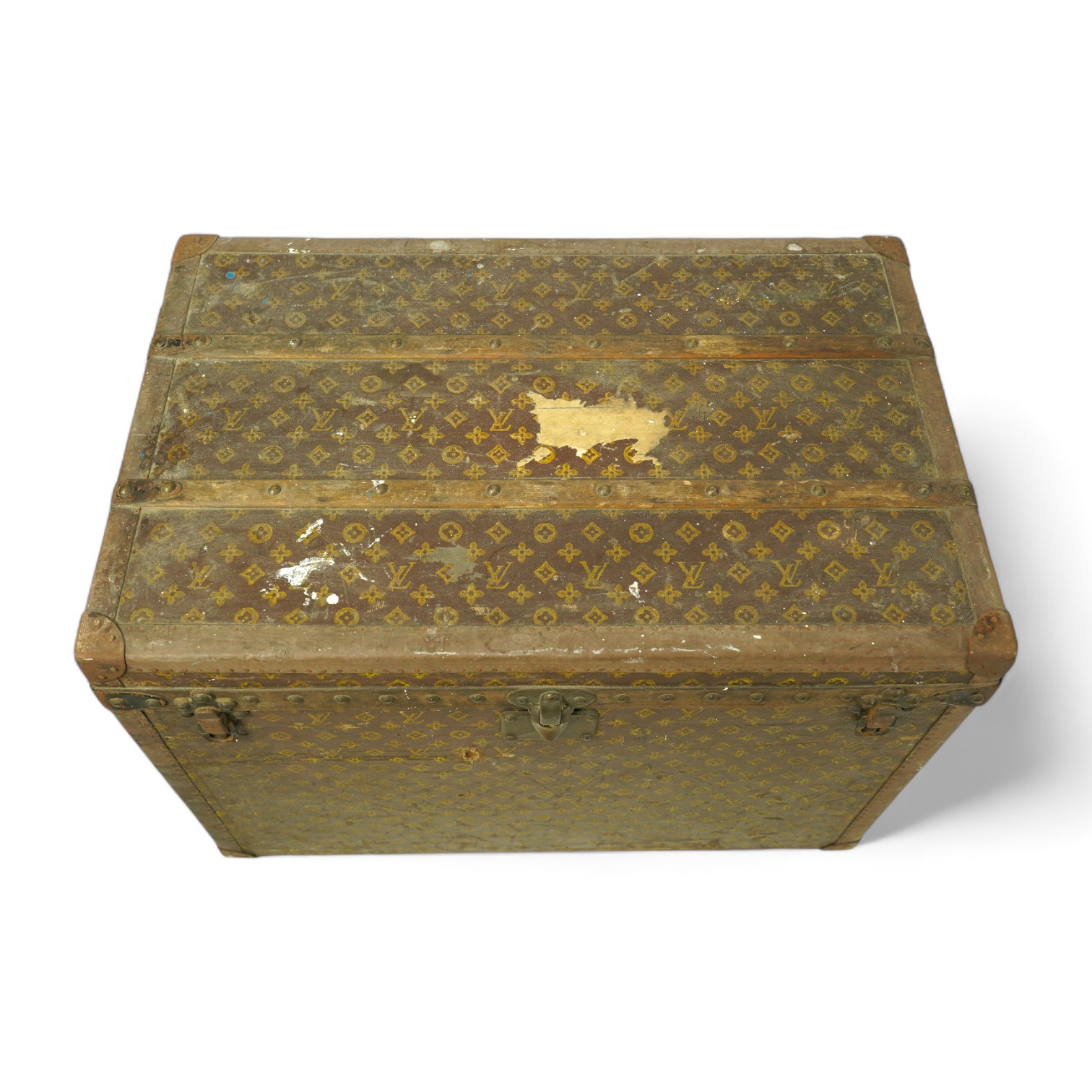 A vintage Louis Vuitton trunk, with black painted iron banding, wooden slats and canvas LV fabric, label for Paris, New Bond Street, Nice and Lille, numbered 776719, the interior with original tray, 76cm wide, 49cm deep,